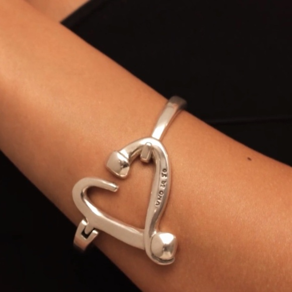 Sterling silver-plated bracelet with nailed heart